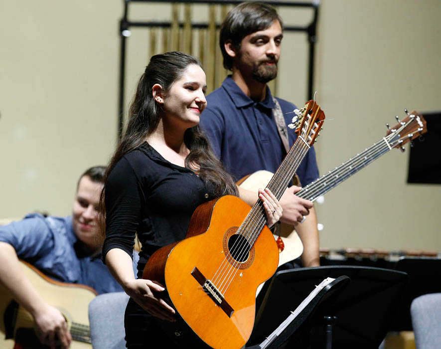 Thunderstruck percussion and guitar ensembles upbeat at first