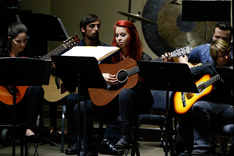 Thunderstruck percussion and guitar ensembles upbeat at first