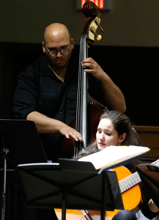 Thunderstruck percussion and guitar ensembles upbeat at first