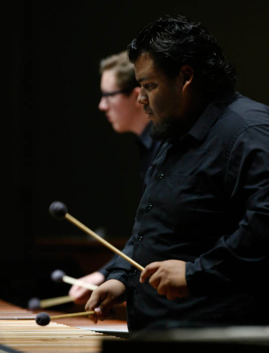 Thunderstruck percussion and guitar ensembles upbeat at first