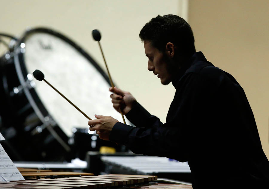 Thunderstruck percussion and guitar ensembles upbeat at first