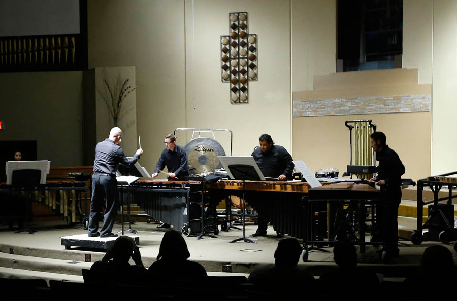 Thunderstruck percussion and guitar ensembles upbeat at first