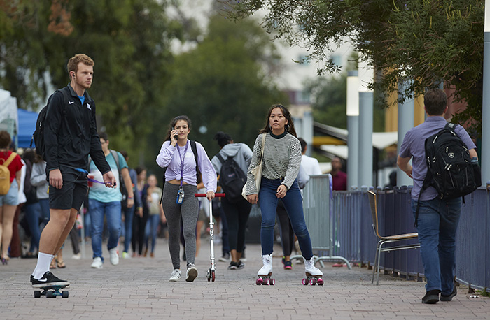 https://news.gcu.edu/app/uploads/2018/10/skating-in-traffic.jpg