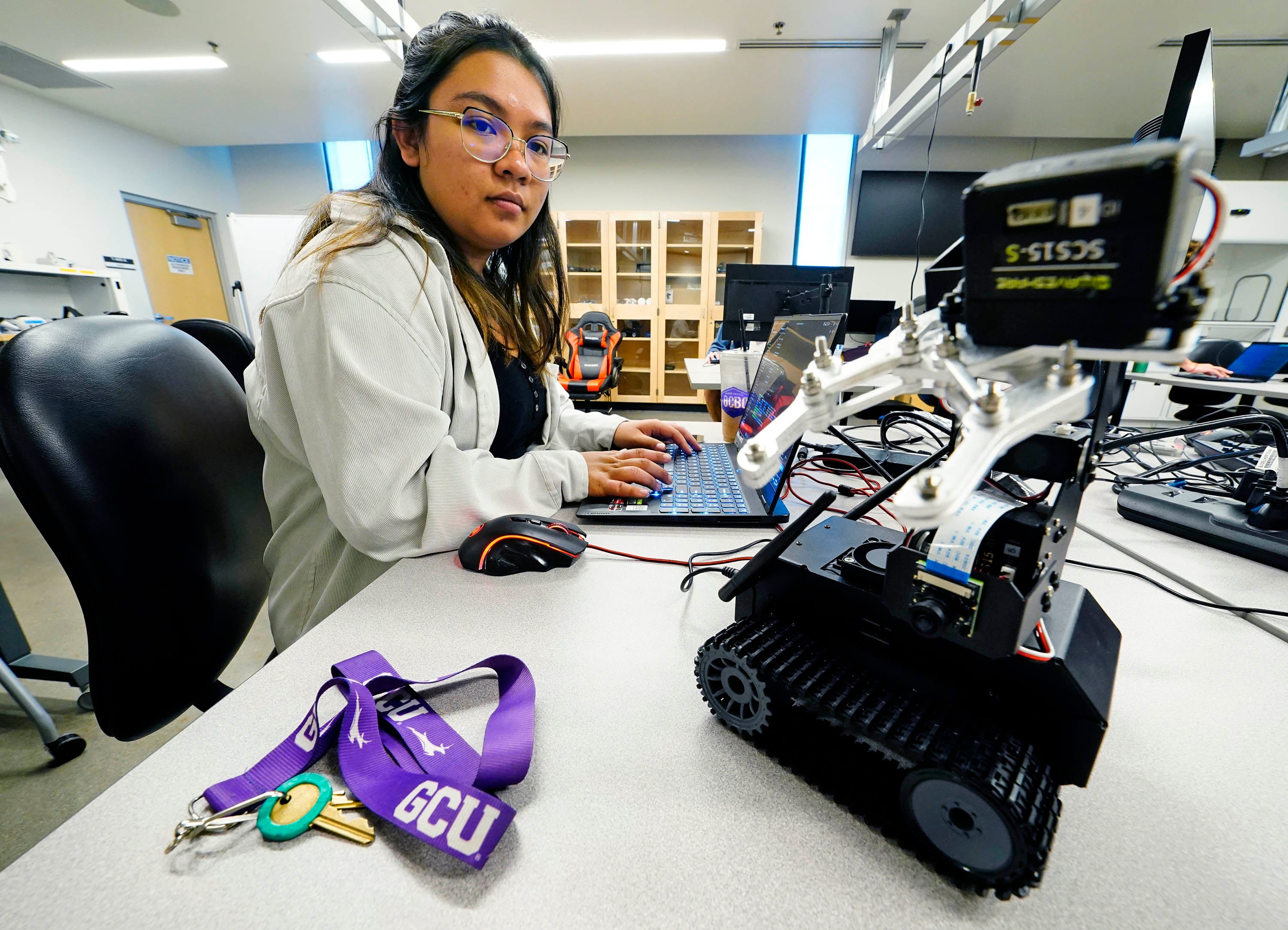Interns cracking the code on making robotics course accessible to online students