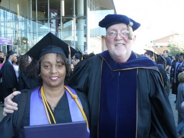 Dalese Braxton and Dr. James Beggs after finding each other at Saturday's commencement on campus.