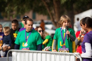 Honorary race starter Jaydon Bartletti, 4, stood tall on Saturday as a cancer-fighting symbol.