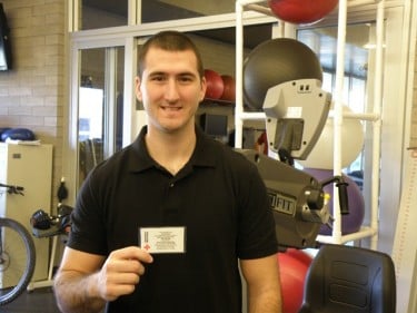 Craig Becker, holding his CPR certification card, said the lifesaving techniques he learned at GCU helped him save the life of a man who nearly choked to death.