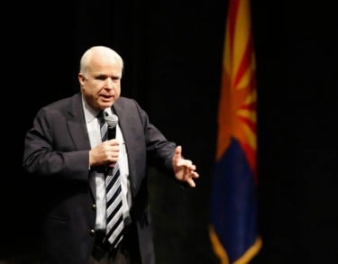 Sen. John McCain speaks to a packed Ethington Theatre audience in Friday's visit to campus.