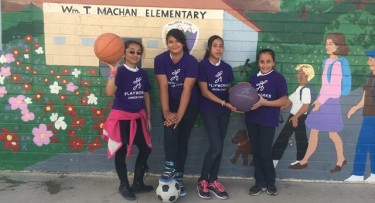 Junior coaches at Machan School, from left, Sbedyi Alvarez, Xochitl Ocegueda, Josselyn Gonzalez and Jessica Velazquez, help keep the peace on the playground. Photo by Evelia (Stacey) McCarty 