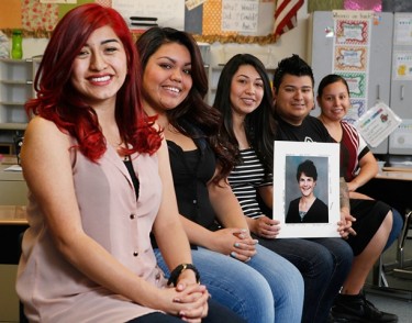 Sydney's Kids, from left, Sarai Pina, Elizabeth Macias, Ada Ortega (holding a portrait of Sydney Browning), Christian Morales and Jessica Reyes fulfilled the promise of a free GCU education, which was extended to them almost 14 years ago. 
