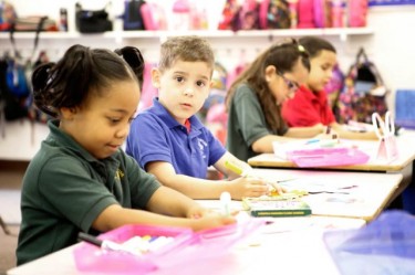 Kindergartners at Phoenix Christian Preparatory School are hard at work in their class. The school is among those that GCU employees support through the Canyon's Donation to Education program. 
