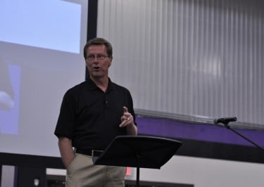 Pastor Tim Griffin has led Chapel services at the Arena and Antelope Gym this year, prior to the summer series at Tell Science Building. (Photo by Darryl Webb)