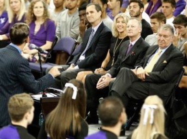 Vaught and his wife, Karri, seated next to Colangelo, listen to President/CEO Brian Mueller's talk at the press conference.