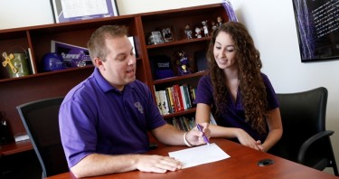 Dave Stakebake and Lily Schwartz of GCU's Career Services office take a look at a resumé.