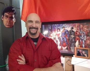 Among Reiber's memorabilia in his Superman workspace are a Christopher Reeves mask and a DC Comics print. 