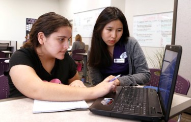 GCU student Jesmine Pradhan (right) works with a high school student at the University's Learning Lounge. 