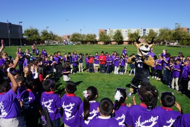 Third graders from Granada Primary School enjoy a dance with Thunder Wednesday on GCU's campus.