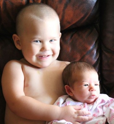 Tyler with his new baby sister, Charli, in 2012 (Photo courtesy of Jennifer Stahlecker)