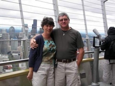 Tammy Bernard-Fraser with her husband, Duncan, at the Space Needle in Seattle.