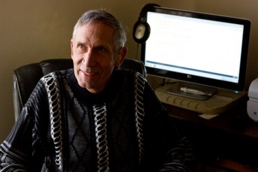 Skinner, who is blind, uses an automated page-reader computer program to read his online coursework and respond to discussion questions. 