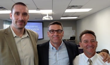 Matt Clark (center) with Brian Smith (left), director of the Colangelo School of Sports Business, and instructor Rick Roth.
