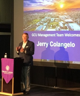 Jerry Colangelo addresses members of GCU's management team Wednesday in Antelope Gym. 