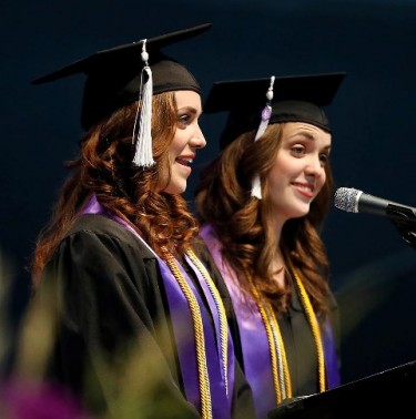 Student speakers Joy (left) and Claire Flatz charmed guests at the Class of 2015 commencement today. (Photo by Darryl Webb) 