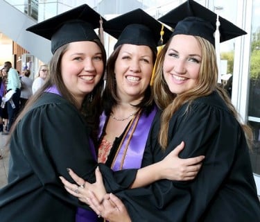 Robyn Sandoz is flanked by her daughters Jordan (left) and Gina. (Photo by Darryl Webb) 