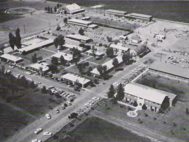 Here's the campus as it started to grow. Building 9, with its brown roof, is where the two parking lots meet in the upper left.