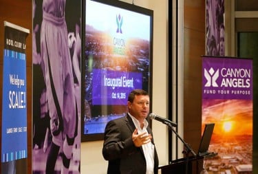 GCU assistant professor Tim Kelley, who organized the Canyon Angels, addresses the investors at the start of Wednesday's meeting.
