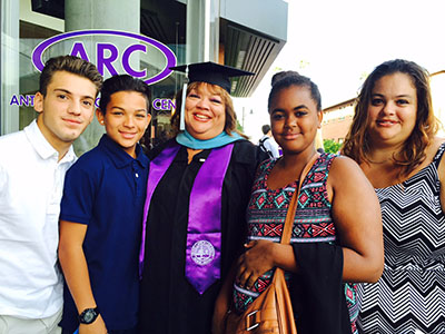 Celebrating with GCU graduate Ernesteen "Tena" Budak are, from left, Luca, son Dylan, Budak, granddaughter Makayla and daughter Stephanie. 