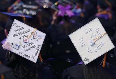 A majority of nursing graduates decorated their mortarboards for commencement. (Photo by Darryl Webb) 