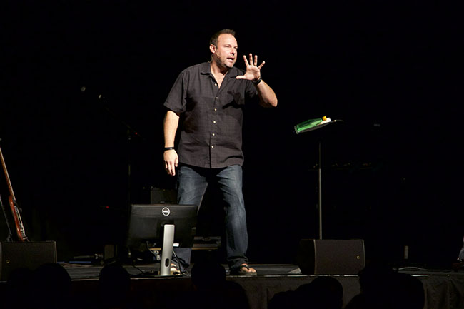 Chris Brown uses his animated speaking style to get across his message Monday at Chapel. (Photo by Cameron Stow)