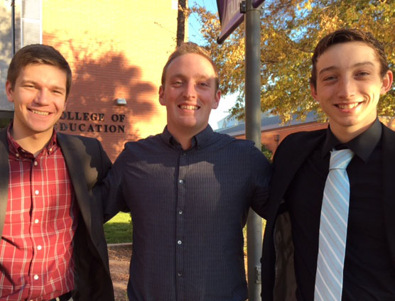 Speech and Debate Team Director Barry Regan, center, with team members Thomas Rotering, left, and Zach Kuykendall, two of the GCU's top parliamentary debaters.