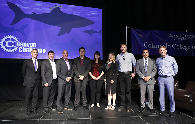 From left: Dr. Randy Gibb, dean of the Colangelo College of Business; Tim Kelley, assistant professor for entrepreneurship and economics; Canyon Challenge judge Sheldon Harris; Raffle Boss founders Erick Roman and Katalina Inzunza; and the other judges, Dr. Lori Soukup, Brad Jannenga, Phoenix Vice Mayor Daniel Valenzuela and GCU President Brian Mueller.