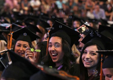 No commencement would be complete without bubbles. (Photo by Darryl Webb)