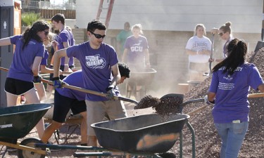 Students pitched in on Habitat for Humanity projects that renovated nearby homes.