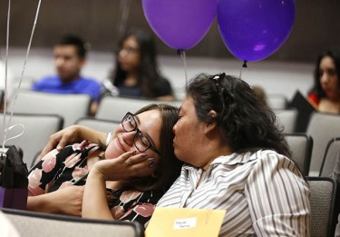 Brenda Batres (left) is the picture of contentment after learning she had received the scholarship.