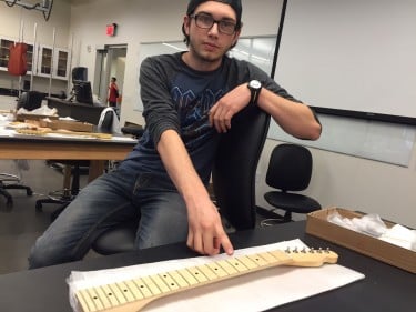 Lapham shows the next stage of building his guitar.