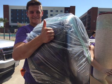 Volunteer Matt Kershinar, a senior, liked the workout he got from moving heavy furniture for freshmen.