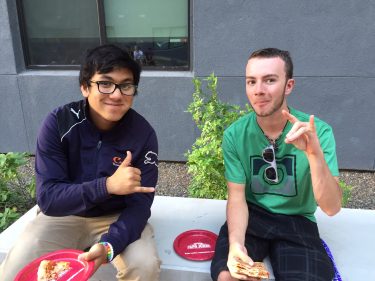 Isaac Suffern, left, from Hawaii, and Nathan Fischbach, of Denver, enjoying pizza at Juniper Hall. 