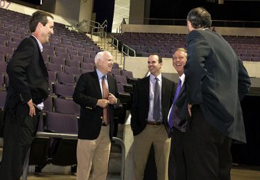 McCain began his visit by spending time at GCU Arena with Dr. Stan Meyer (left), chief operating officer; Brian Roberts (center), general counsel; President Brian Mueller (looking toward camera) and Dan Bachus (back to camera), chief financial officer. 