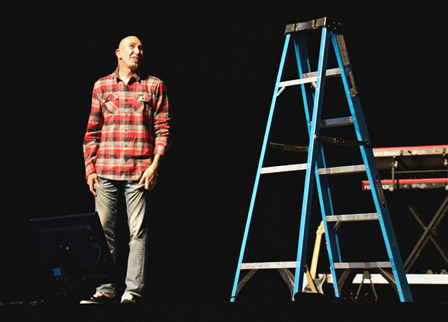 Ron Merrell of Heights Church in Prescott used a ladder as a prop during his Chapel talk Monday. (Photo by Kaitlyn Terrey)