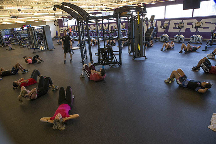 The noontime boot camp now meets in the new workout room on the second floor of the Lopes Performance Center. (Photo by Darryl Webb) 