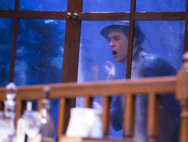 The set includes the magic of snow as Sergeant Trotter (Trevor Penzone) gazes inside the frosty window.