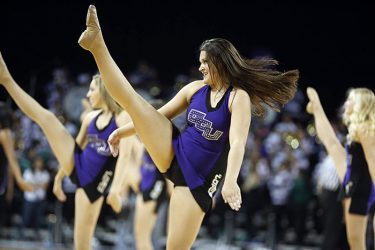 The cheer and dance teams are an important part of the game experience.