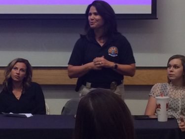 Lauri Burgett of the Phoenix Police Department addresses the audience at the "Ask an Alum" event Thursday night. She is flanked by fellow GCU alumna Amanda Lasita and Patricia Greenough.