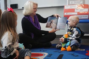 Dr. Kim LaPrade reads her book, "Thunder's Vision" to a group of youngsters Tuesday at Grand Canyon University. The 14-page children’s book follows Thunder, a curious little Lope struggling to find his purpose.