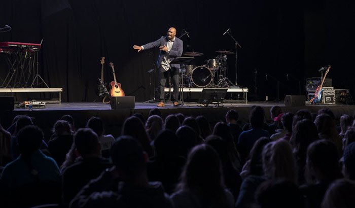 Oye Waddell, pastor of New City Church and founder of Hustle PHX, delivers his Chapel talk Monday. (Photo by Slaven Gujic)